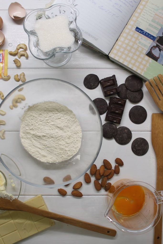 Aerial view of baking ingredients and tools ready for cooking.